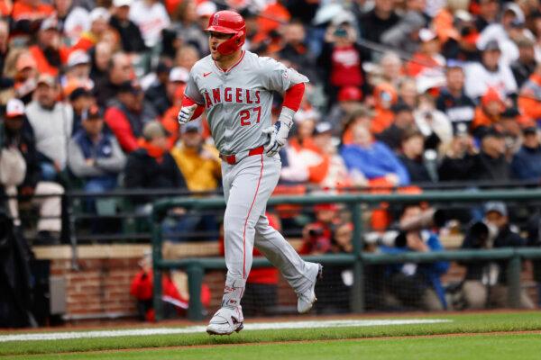 Mike Trout of the Angels trots home after hitting a first-inning home run in Baltimore on March 28, 2024. (Julia Nikhinson/AP Photo)