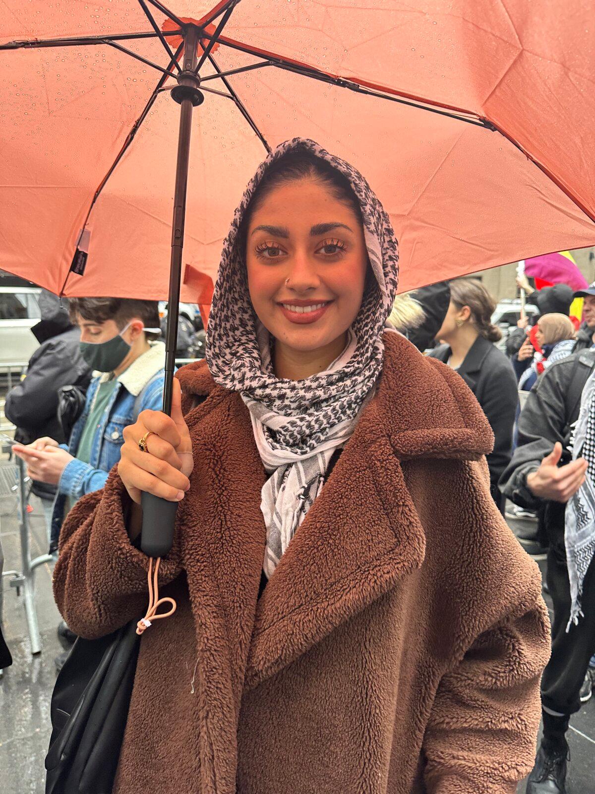 Arij Raja attends the "Abandon Biden" rally in front of Radio City Music Hall in New York on March 28, 2024. (Juliette Fairley/The Epoch Times)