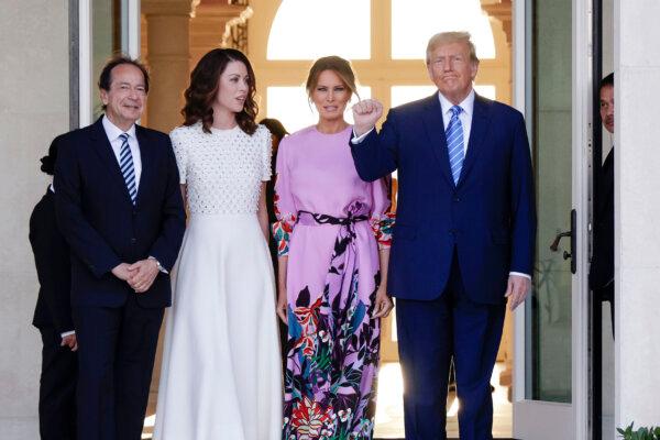 Republican presidential candidate and former President Donald Trump (R) and former First Lady Melania Trump (2nd R) arrive at the home of John Paulson (L) with his fiancee Alina de Almeida (2nd L) in Palm Beach, Fla., on April 6, 2024. (Alon Skuy/Getty Images)