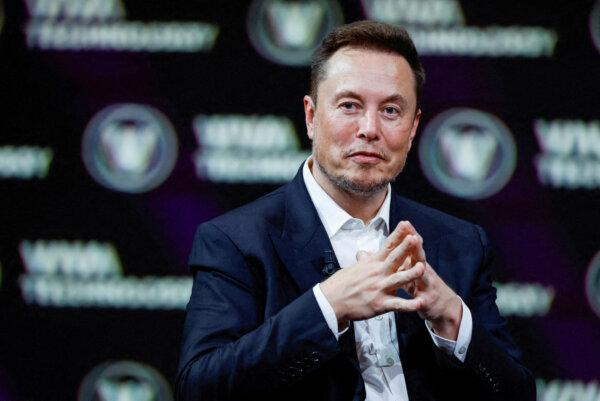 Elon Musk, CEO of SpaceX and Tesla, gestures as he attends a conference at the Porte de Versailles exhibition center in Paris on June 16, 2023. (Gonzalo Fuentes/Reuters)