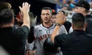 Late Rally Gives Giants Victory Over Frustrated Marlins