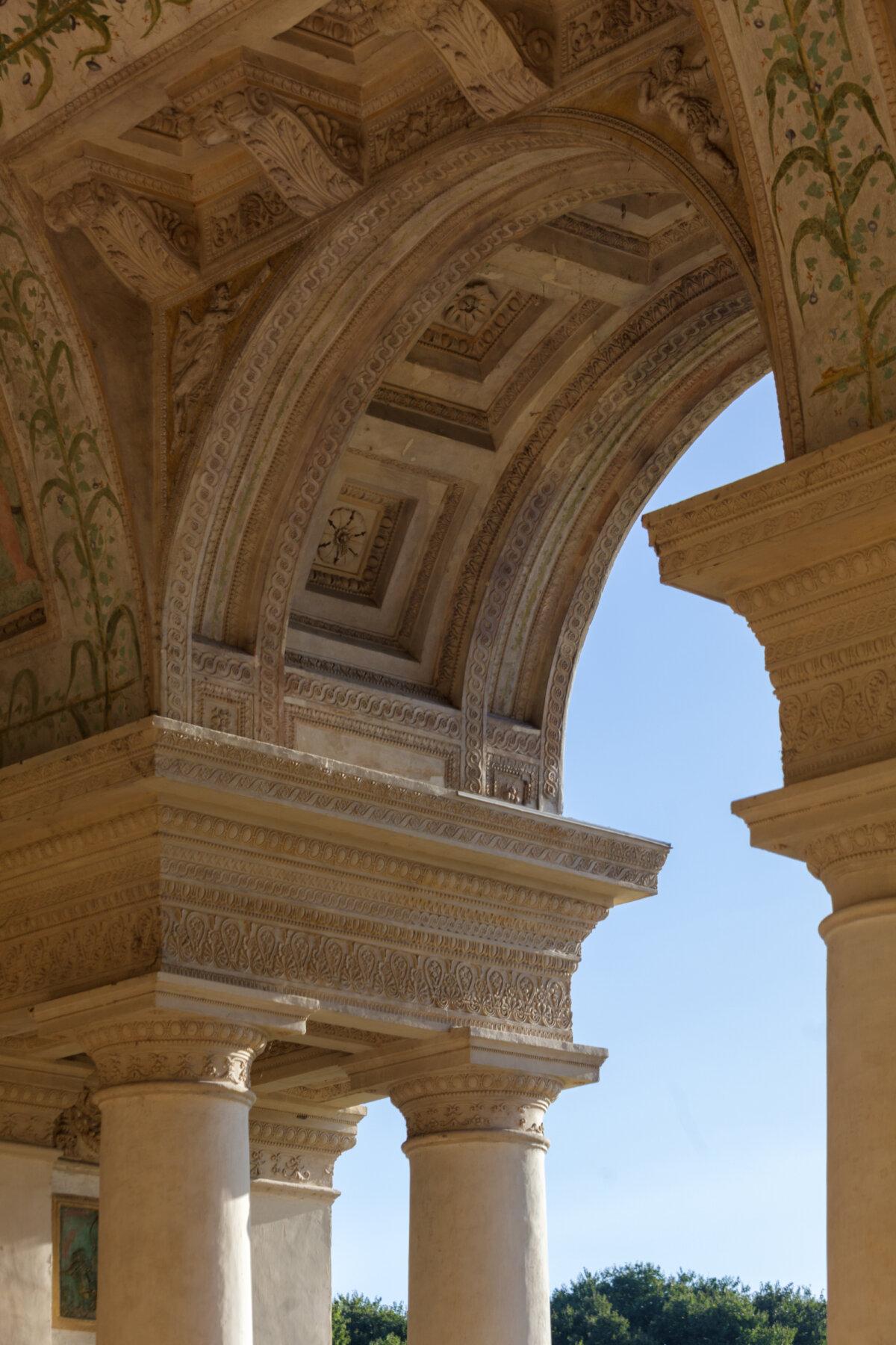 Like finely crafted lace, intricate ornamentation softens the material and invites viewers to explore the detail of the arch. Here, rosettes within the arch, angles, and floral decoration provide refinement in the Loggia of David. (J.H. Smith)