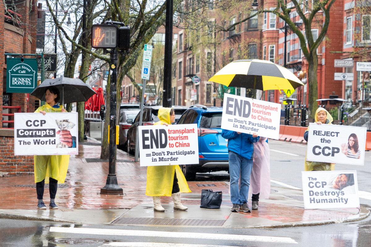 Falun Gong practitioners at Harvard Kennedy School in Cambridge, Mass., on April 20, 2024. (Learner Liu/The Epoch Times)