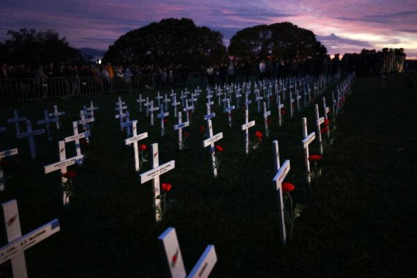 Crosses commemorate as Aucklanders attend the Anzac Day Dawn Service at Auckland War Memorial Museum in New Zealand, on April 25, 2024. (Fiona Goodall/Getty Images for Auckland War Memorial Museum)