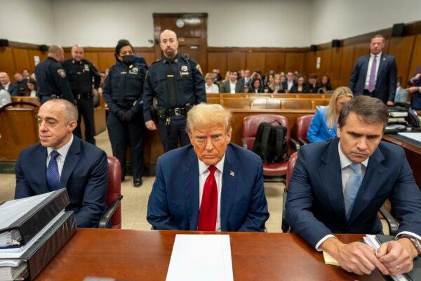 Former President Donald Trump appears in court with his attorneys Emil Bove (L) and Todd Blanche during his trial for allegedly covering up hush money payments at Manhattan Criminal Court on April 25, 2024 in New York City.  (Photo by Mark Peterson-Pool/Getty Images)