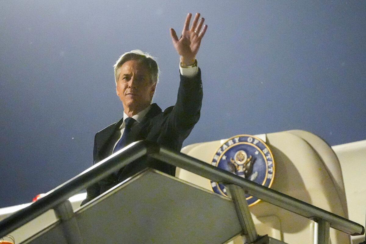 U.S. Secretary of State Antony Blinken waves as he prepares to return to the United States following a visit to China, at the Beijing Capital International Airport in Beijing on April 26, 2024. (Mark Schiefelbein/Pool/AFP  via Getty Images)