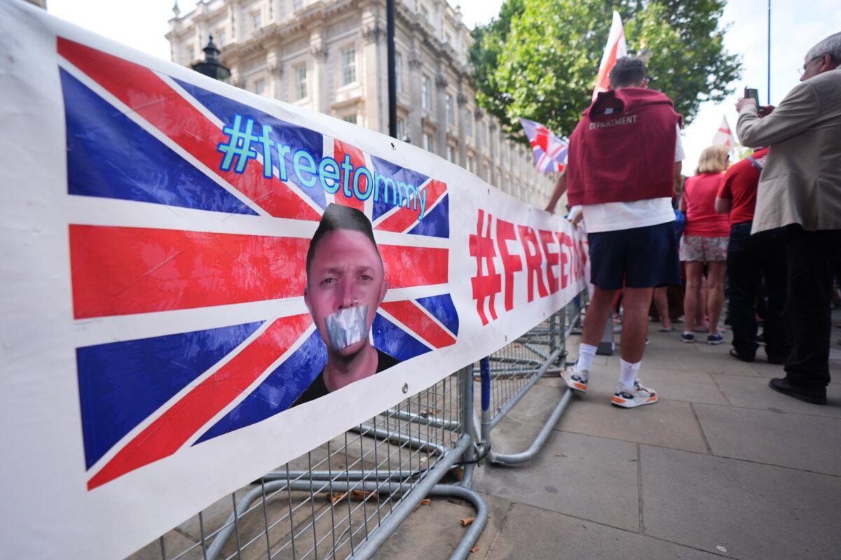 Protesters outside Downing Street in London protesting the reported arrest of Tommy Robinson on July 28, 2024. (James Manning/PA Wire)