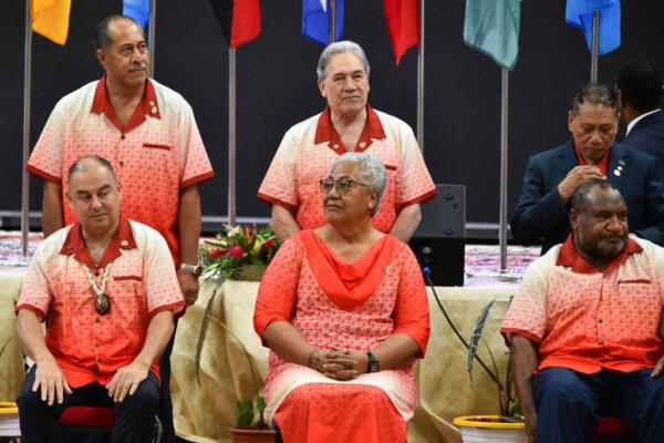 New Zealand's Foreign Minister Winston Peters (top C), with Cook Islands' Prime Minister Mark Brown (lower L). Also in the photo are Samoa's Prime Minister Fiame Naomi Mata'afa (lower C) and Papua New Guinea's Prime Minister James Marape (lower R). They are pictured at the Pacific Islands Forum in Nuku'alofa on August 26, 2024. (Photo by Mary Lyn FONUA / AFP)