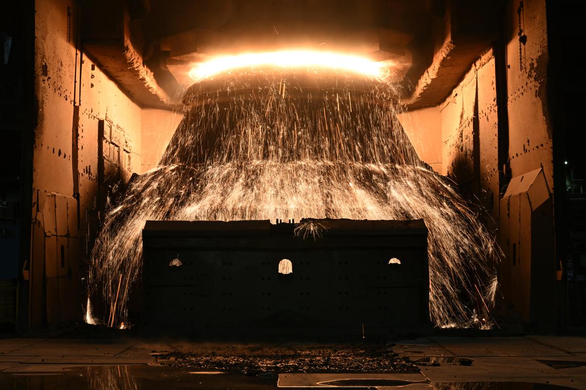 Molten steel is made in the BOS, slab caster and steel treatment factory at BlueScope Steelworks in Port Kembla, Wollongong in New South Wales of Australia on Feb. 9, 2024. (AAP Image/Dean Lewins)