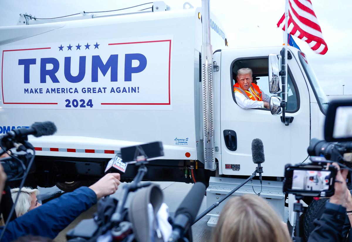 US President Donald Trump holds a press conference from inside trash hauler at Green Bay Austin Straubel International Airport on Oct. 30, 2024. (Chip Somodevilla/Getty Images)