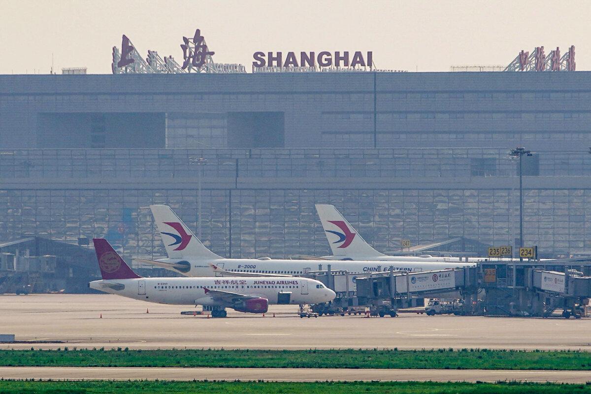China Eastern Airlines aircraft are seen parked on the apron in Hongqiao International Airport in Shanghai on June 4, 2020. (Aly Song/Reuters)