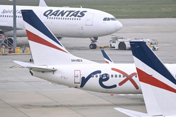 Rex Airlines Boeing 737 planes lay idle on the tarmac at Melbourne's Tullamarine Airport on July 31, 2024. (William West/AFP via Getty Images)