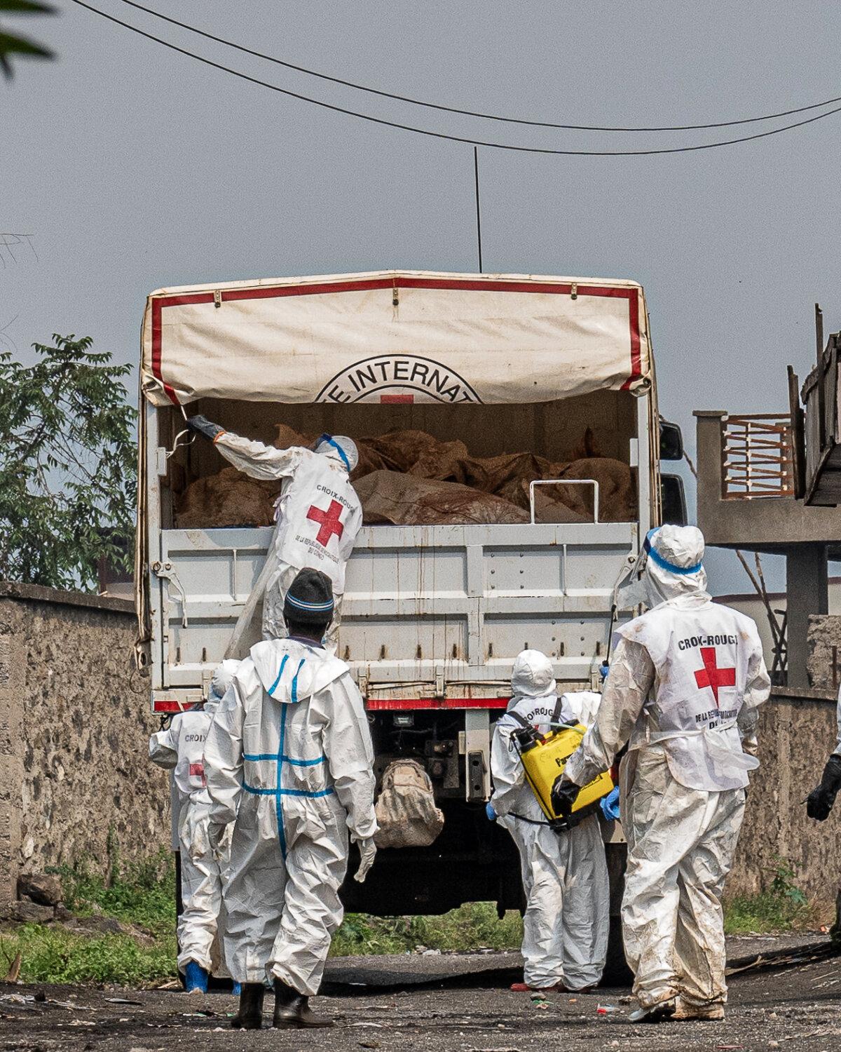 Red Cross personnel load bodies of victims of the fighting between Congolese forces and M23 rebels in Goma, Democratic Republic of Congo, on Feb. 3, 2025. (Moses Sawasawa/AP Photo)