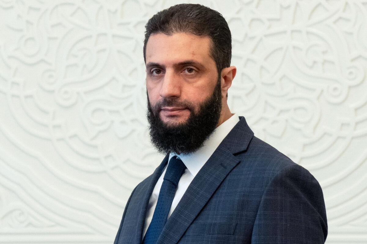 Syria's de facto leader, Ahmad al-Sharaa, formerly known as Abu Mohammed al-Golani, at the presidential palace ahead of his meeting with Walid Ellafi, Libyan minister of state for communication and political affairs, in Damascus, Syria, on Dec. 28, 2024. (Mosa'ab Elshamy/AP Photo)