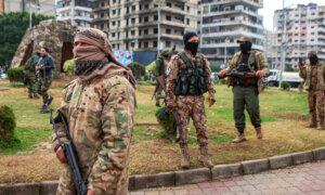 Post-Assad Syria Dogged by Reports of Sectarian Violence, Insurgent Attacks