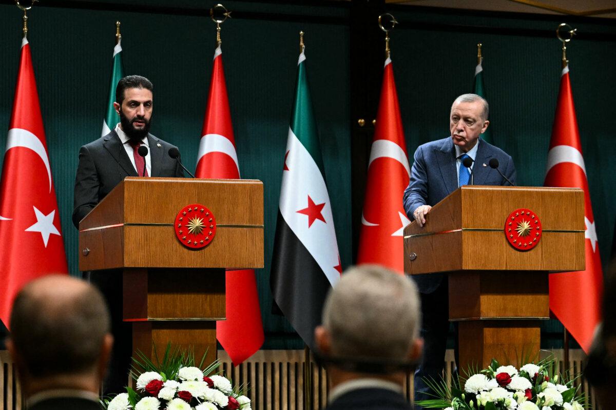 Turkish President Recep Tayyip Erdogan (R) and Syria's interim president Ahmed al-Sharaa hold a joint press conference in Ankara, on Feb. 4, 2025. (Ozan Kose/AFP via Getty Images)