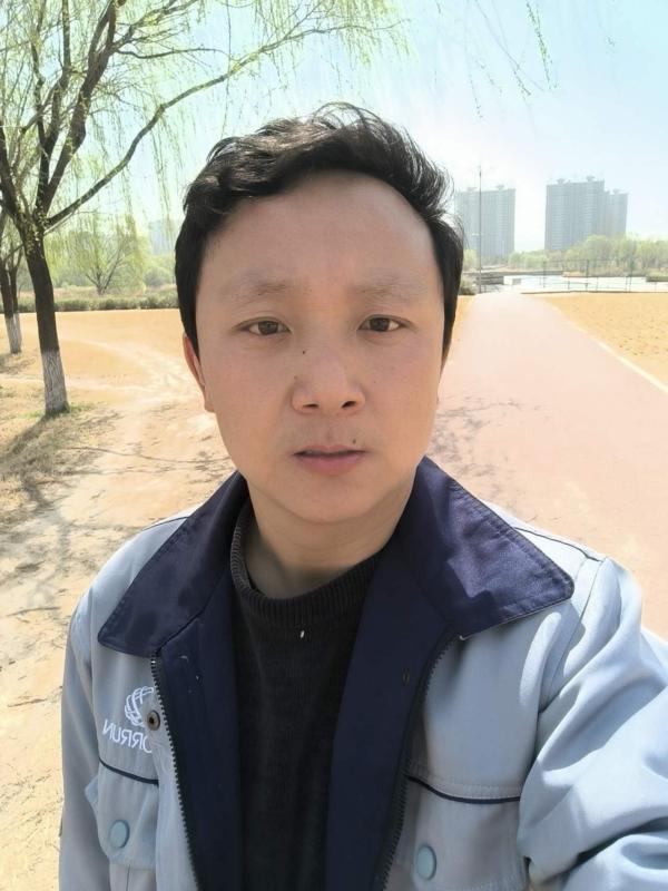 Zhao Jie wearing a work uniform while in China in an undated photo. (Courtesy of Zhao Jie)