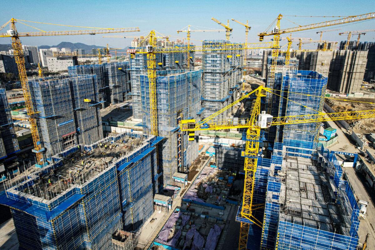 Residential buildings under construction by Chinese real estate developer Vanke in Hangzhou, Zhejiang Province, China, on March 15, 2024. (STR/AFP via Getty Images)