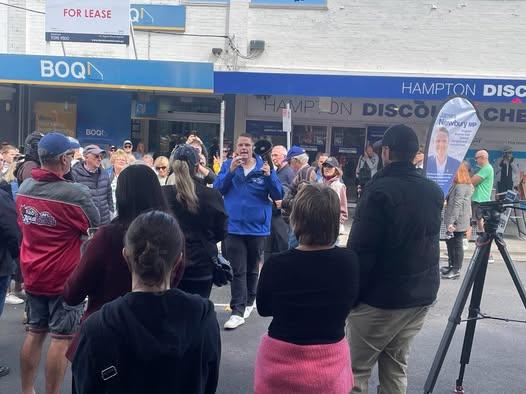 Victoria Liberal Member for Brighton and Shadow Treasurer James Newbury addresses local residents at the Bayside Against Crime community rally in Melbourne, Australia. (Josh Spasaro/The Epoch Times)
