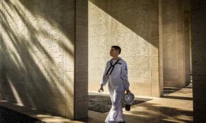 Day in Photos: Manila Liberation Day, Shooting in Pennsylvania, Roof Collapse in Peru