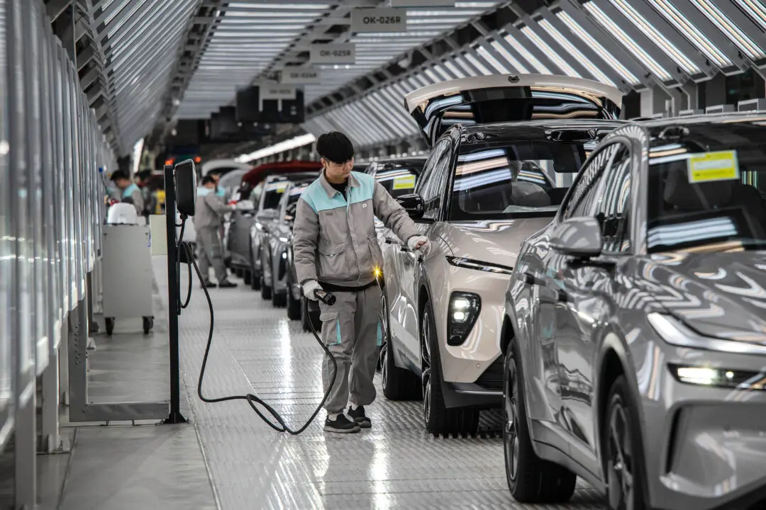 Rights Groups Urge Ottawa to Maintain Chinese EV Tariffs Amid Canola Dispute