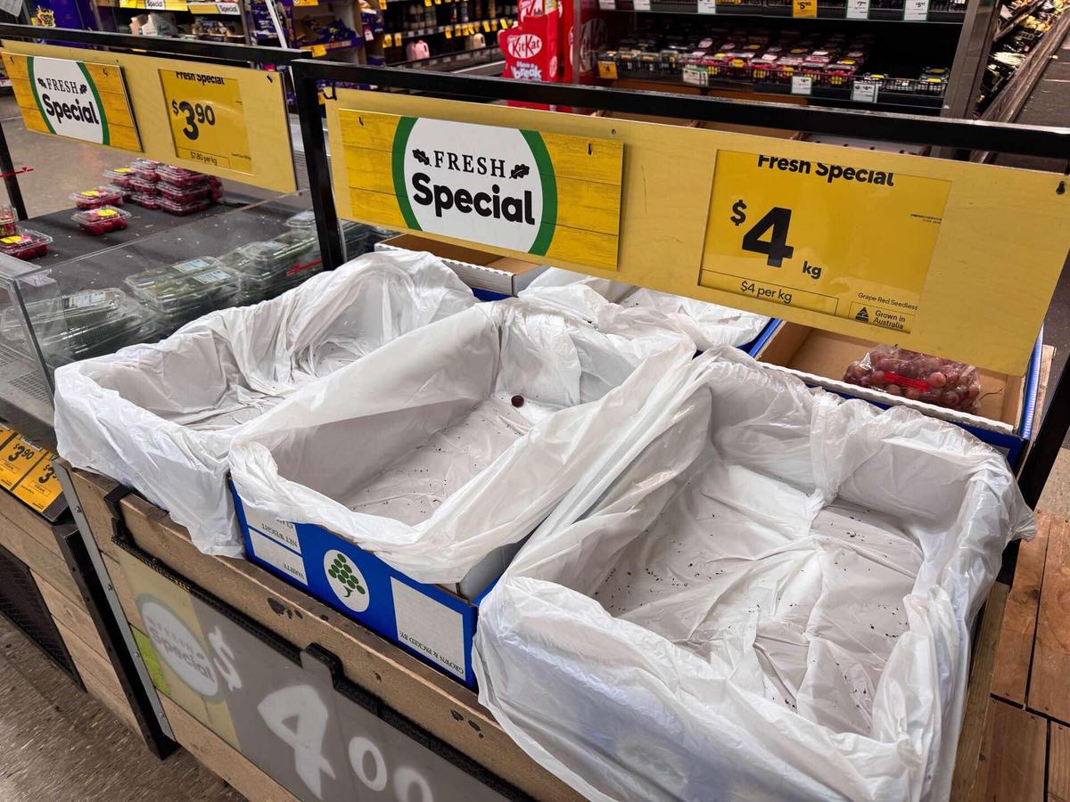 Empty grape stand at a Woolworths store in Sunnybank Hills in Brisbane, Australia on March 3, 2025, as residents prepare for Cyclone Alfred. (Daniel Y. Teng/The Epoch Times)