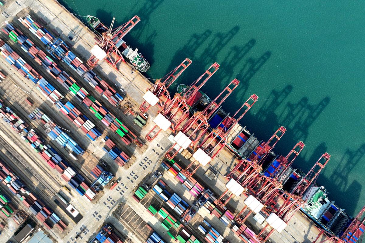 A container ship is loaded at the port in Lianyungang, in China's eastern Jiangsu province on Dec. 10, 2024. (STR/AFP via Getty Images)