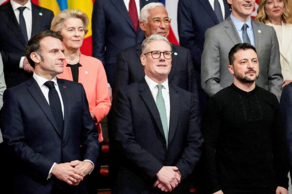 (L–R) France's President Emmanuel Macron, Britain's Prime Minister Sir Keir Starmer, and Ukraine's President Volodymyr Zelenskyy at a summit held at Lancaster House in central London on Mar. 2, 2025. (Christophe Ena/AFP via Getty Images)