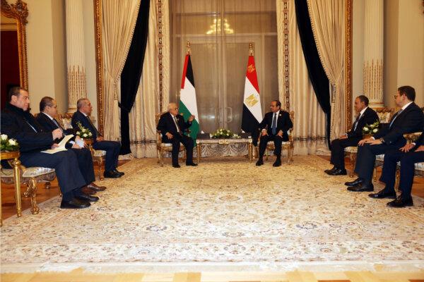 Palestinian President Mahmoud Abbas meets with the Egyptian President Abdel Fattah al-Sisi, during the emergency Arab summit organized by Egypt this week in Cairo, Egypt, on March 4, 2025. (Palestinian President Office/Handout via Reuters)