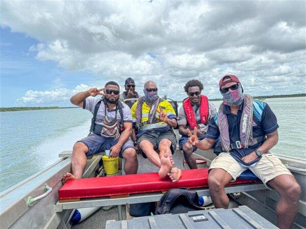 Members of the delegation travel by boat in PNG. (Darrol Williams/Department of Agriculture, Fisheries and Forestry)