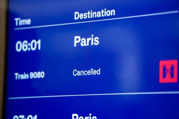 A cancelled train to Paris is highlighted on a a departures screen at St. Pancras station in London on March 7, 2025. (James Manning/PA)