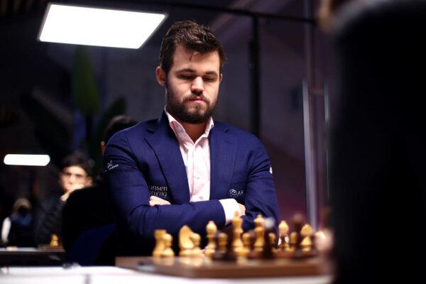 Magnus Carlsen of Norway competes against Daniil Dubov of Russia during the 82nd Tata Steel Chess Tournament held at the home of PSV football club, Philips Stadion in Eindhoven, Netherlands, on Jan. 16, 2020. (Dean Mouhtaropoulos/Getty Images)