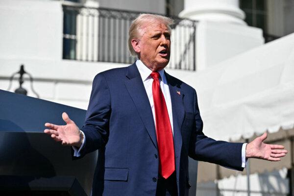 President Donald Trump speaks to the press on the South Portico of the White House on March 11, 2025. (Mandel Ngan/AFP via Getty Images)