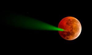 Day in Photos: Full Moon Eclipse, SpaceX Rocket Launch, and Java Flood