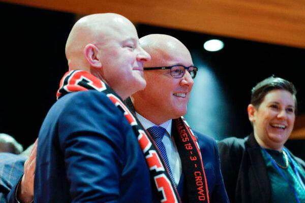 Mental Health Minister Matt Doocey (L) with Prime Minister Christopher Luxon (C) during the National Party Annual Conference at Michael Fowler Centre in Wellington, New Zealand, on June 25, 2023. (Hagen Hopkins/Getty Images)