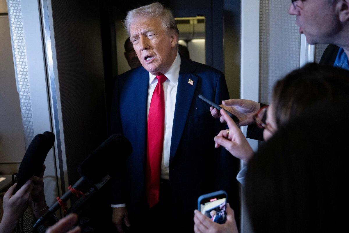 President Donald Trump speaks to reporters while returning to Washington on Air Force One on March 30, 2025. (Brendan Smialowski/AFP via Getty Images)