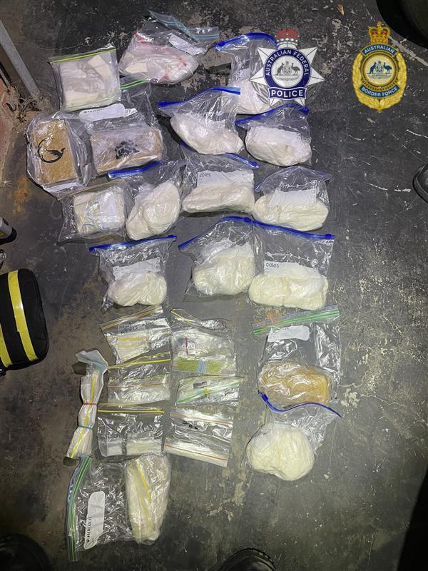 Some of the inert substance, swapped for cocaine by Police, seized during the raids. (Courtesy of the AFP)