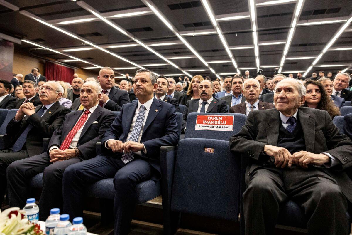 CHP leader Ozgür Ozel (C) sits next to an empty seat reserved for arrested Istanbul Mayor Ekrem Imamoglu at an extraordinary party congress in Ankara on April 6, 2025. (Serdar Ozsoy/Getty Images)