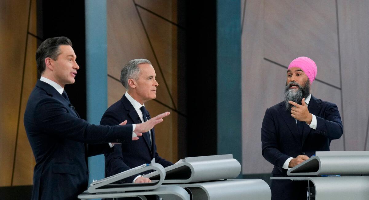 (L-R) Conservative Leader Pierre Poilievre, Liberal Leader Mark Carney, NDP Leader Jagmeet Singh speak during the English-language leaders' debate in Montreal on April 17, 2025. (Christopher Katsarov/Pool/AFP via Getty Images)