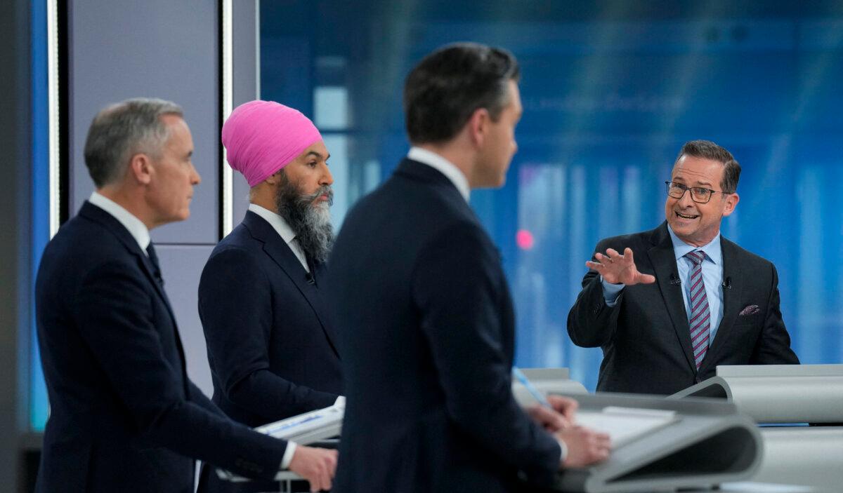Bloc Quebecois Leader Yves-Francois Blanchet (R) speaks as other party leaders listen during the English-language leaders' debate in Montreal on April 17, 2025. (Adrian Wyld/Pool/AFP via Getty Images)