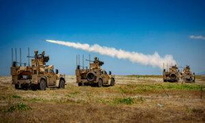 Day in Photos: Military Exercises in Philippines, Missile Strike in Yemen, and Blooming Flowers in Japan