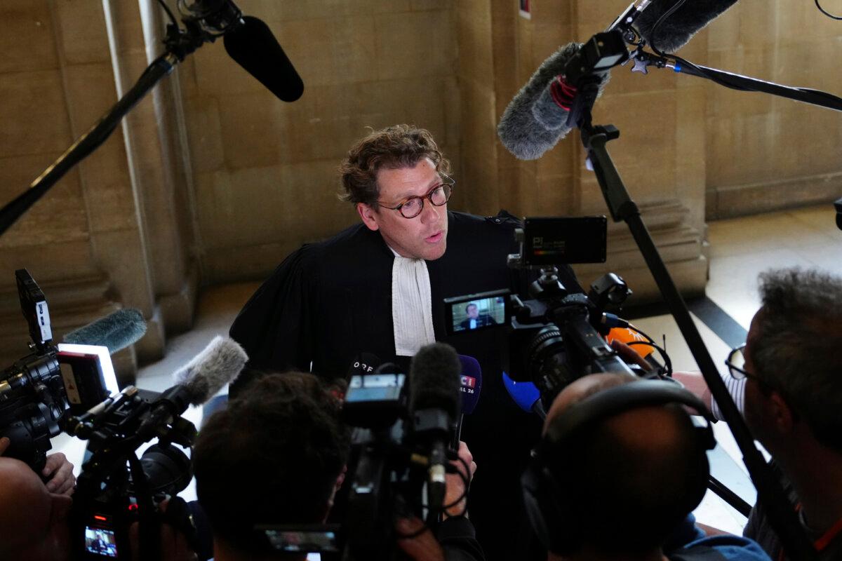 Joseph Hazan, a lawyer for Aomar Aït Khedache, one of the men accused in the 2016 armed robbery of Kim Kardashian, talks to the press at the palace of justice in Paris on April 28, 2025. (Aurelien Morissard/AP Photo)