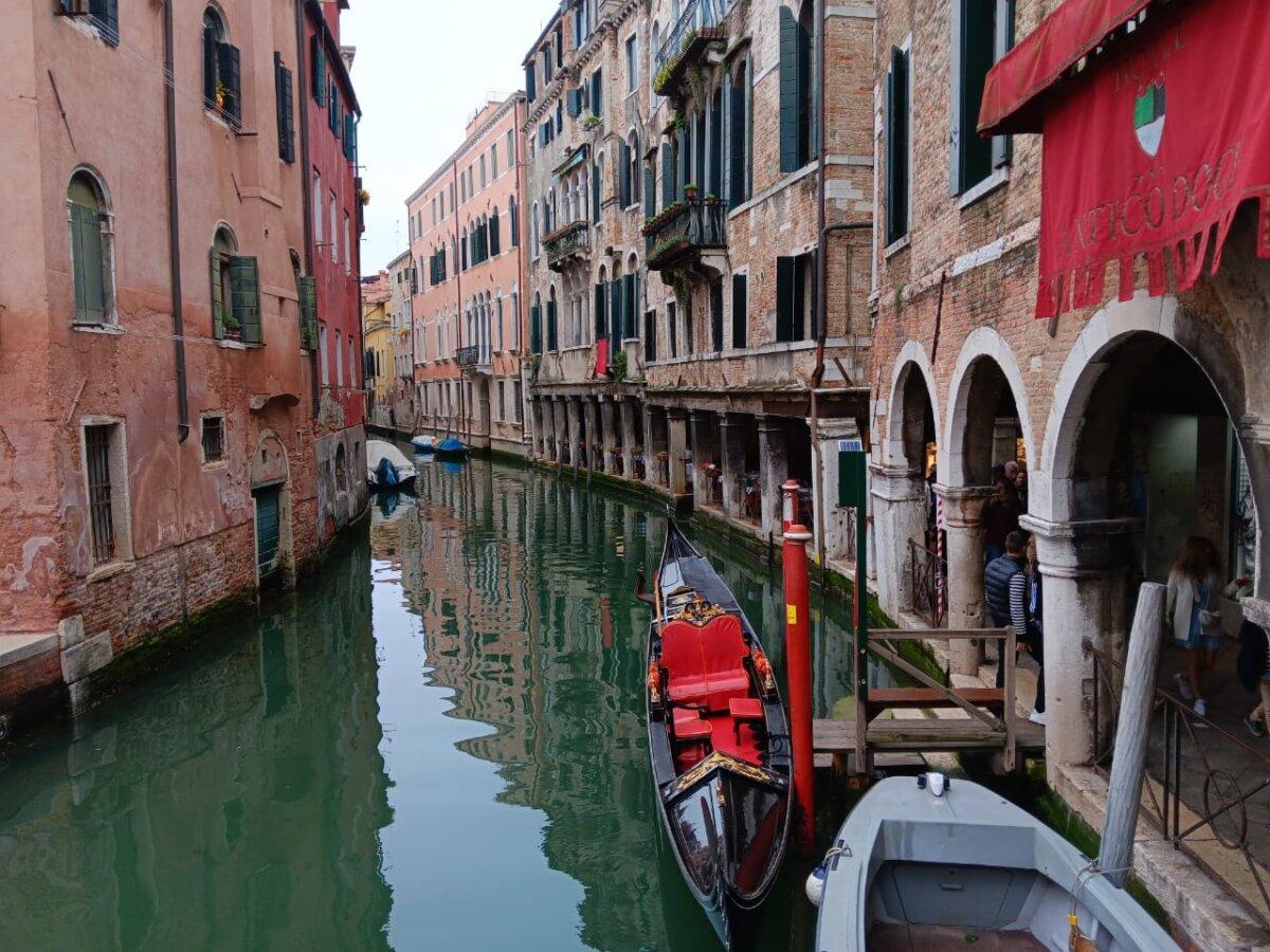 Houses along a canal in Venice, Italy, on April 28, 2025. (Autumn Spredemann/The Epoch Times)