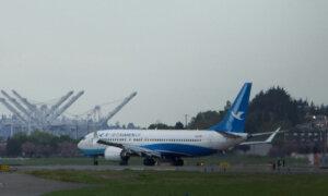 Boeing Narrows Losses on Strong Sales, Confirms China Halted Deliveries