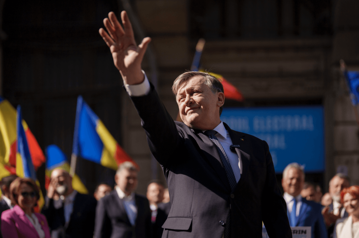 Crin Antonescu waves after registering his bid with the electoral authority in Bucharest, Romania, on March 9, 2025. (Vadim Ghirda/AP Photo)