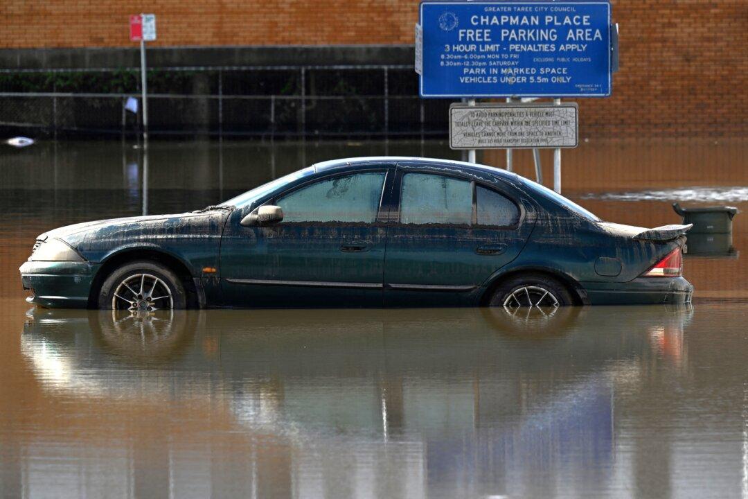 ‘A Fight Cleaning Up’: Community Perseveres After Floods Dump 60,000 Tonnes of Waste