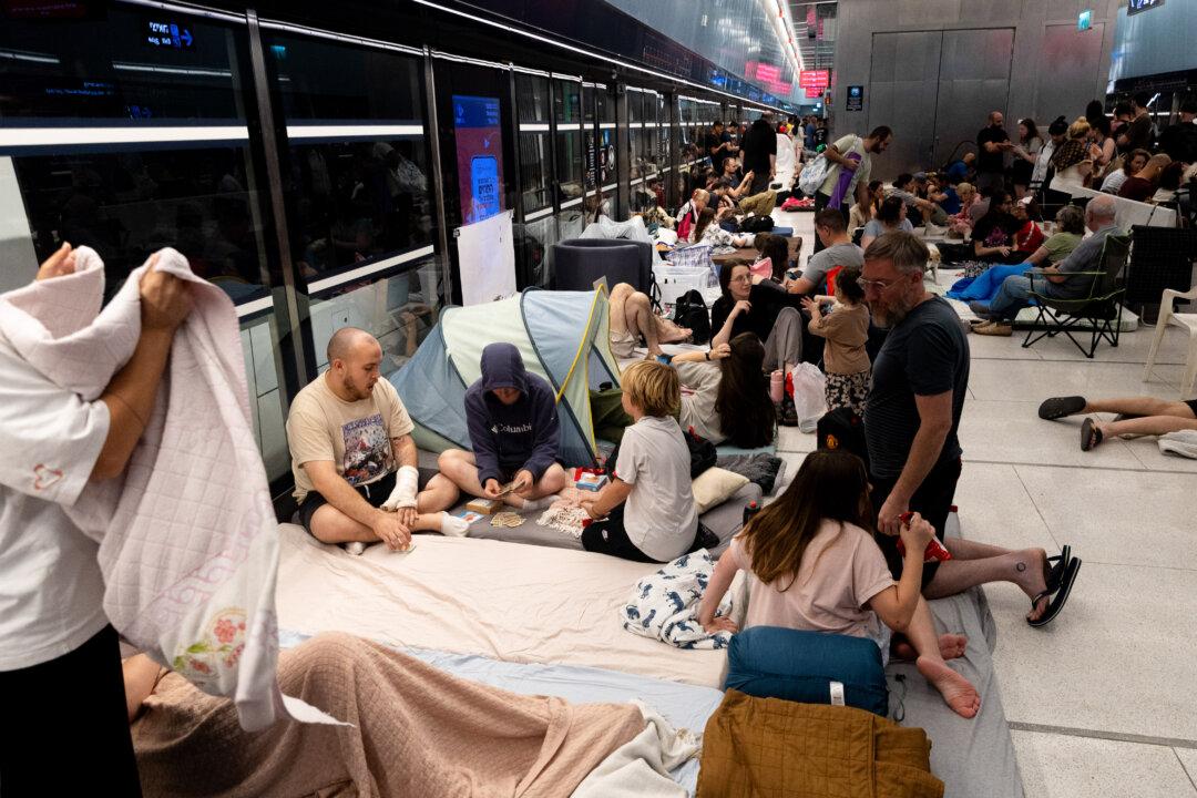 As Evacuations From Israel Begin, Some Australians Choose to Stay