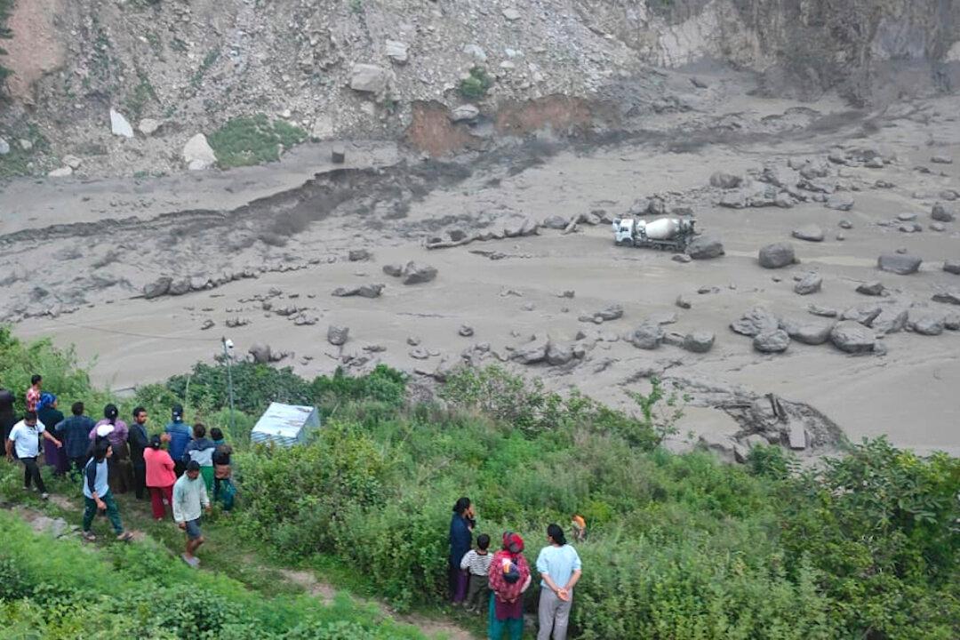 Monsoon Floods Sweep Away 20 People and Main Bridge Linking Nepal to China