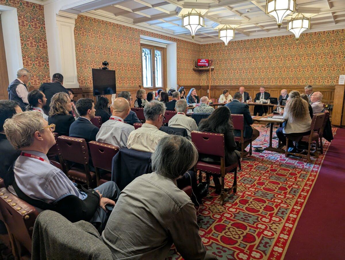 An audience listens during a parliamentary seminar on the CCP’s accelerating transnational repression, in the UK Parliament in London on July 15. (Shaoying/The Epoch Times)