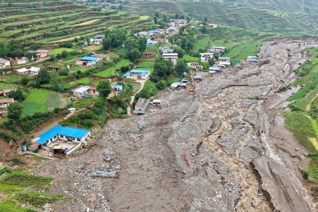 China Flash Floods Kill at Least 10 People in Gansu Province, 33 Missing